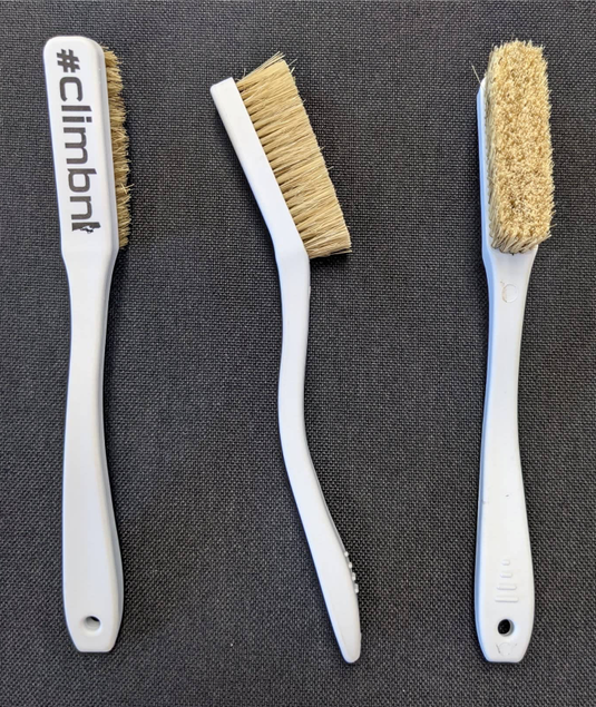 White plastic boars hair bristle climbing chalk brush