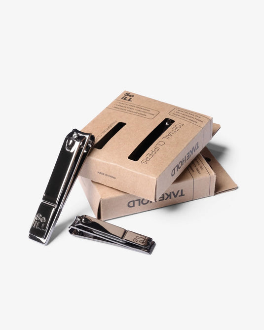 Nail clippers with cardboard packaging on a white background