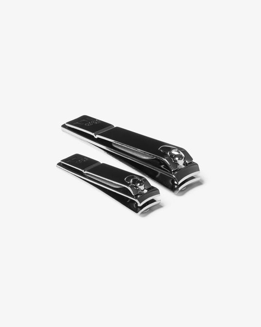 Black nail clippers on a white background